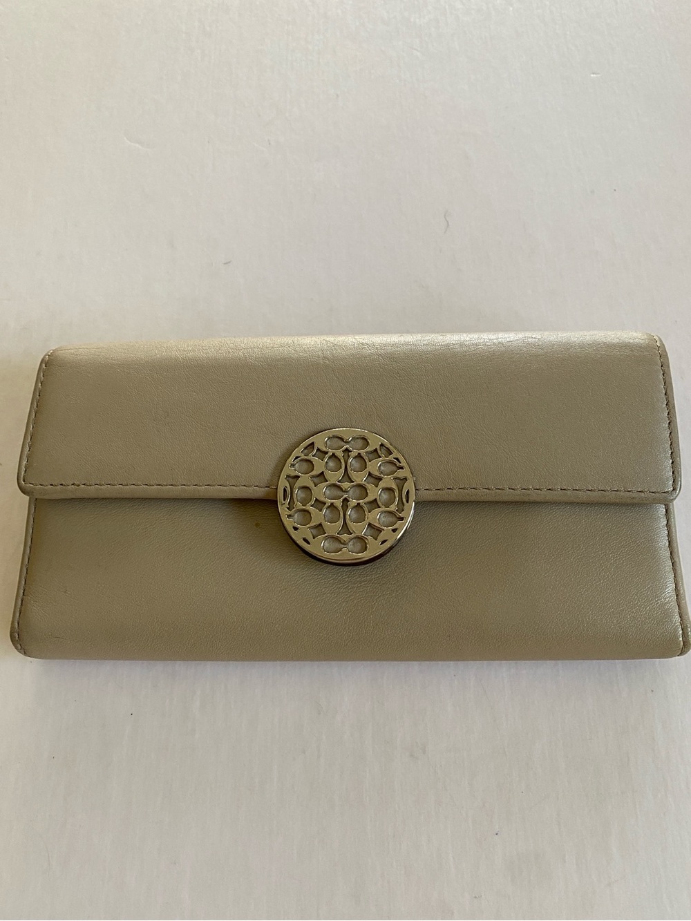 Coach Leather Trifold Clutch Wallet with Decorative Round Clasp - Taupe - Picture 1 of 5